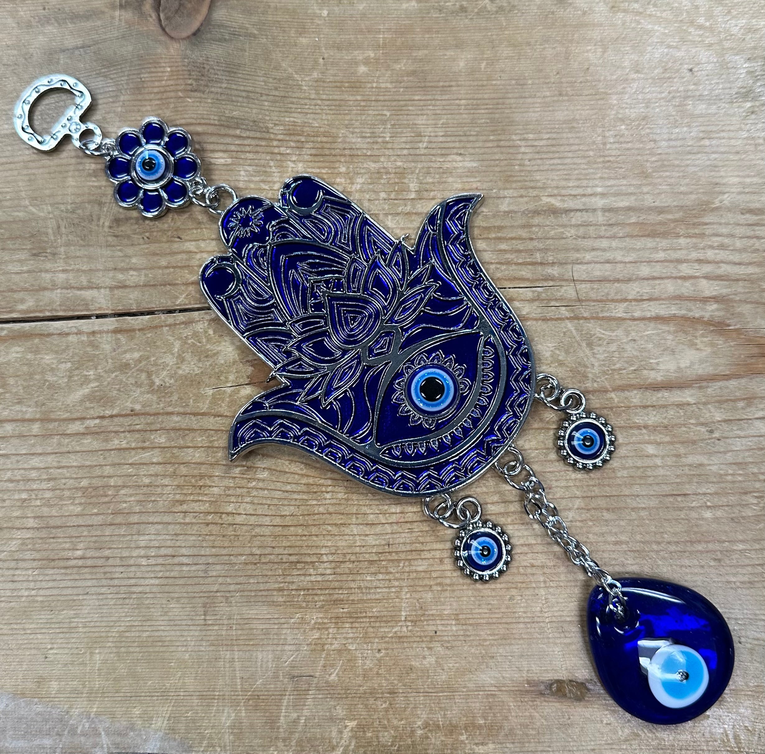 Colgante de luna azul con mal de ojo